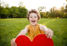 Boy Holding Heart