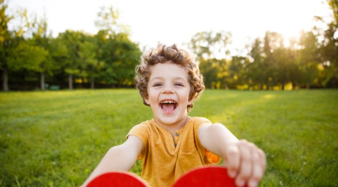 Boy Holding Heart